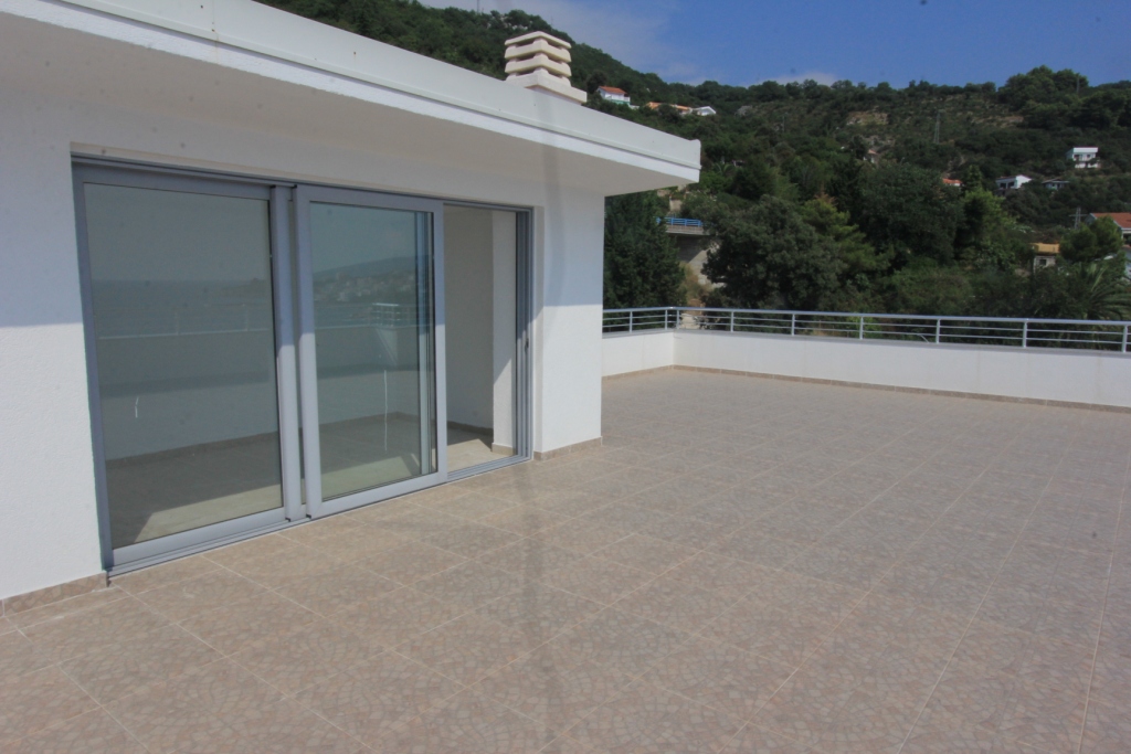 Apartments in a complex with a swimming pool and sea views in Dobra Voda