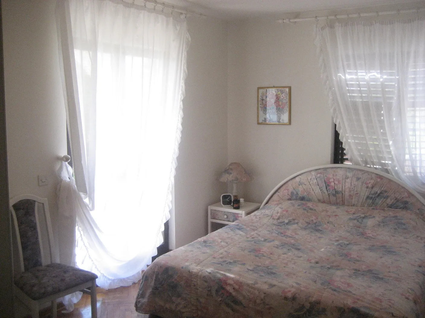 Spacious house surrounded by palm trees